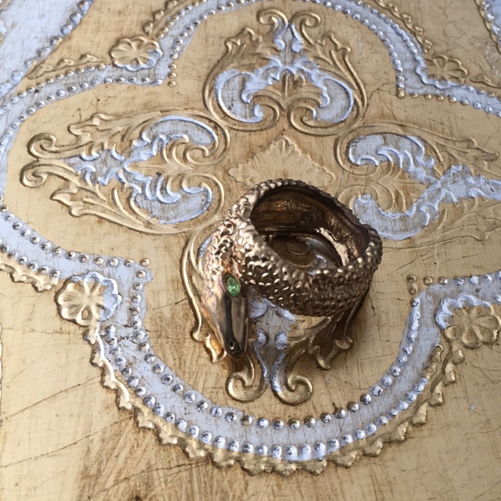 Costume snake ring with green crystal